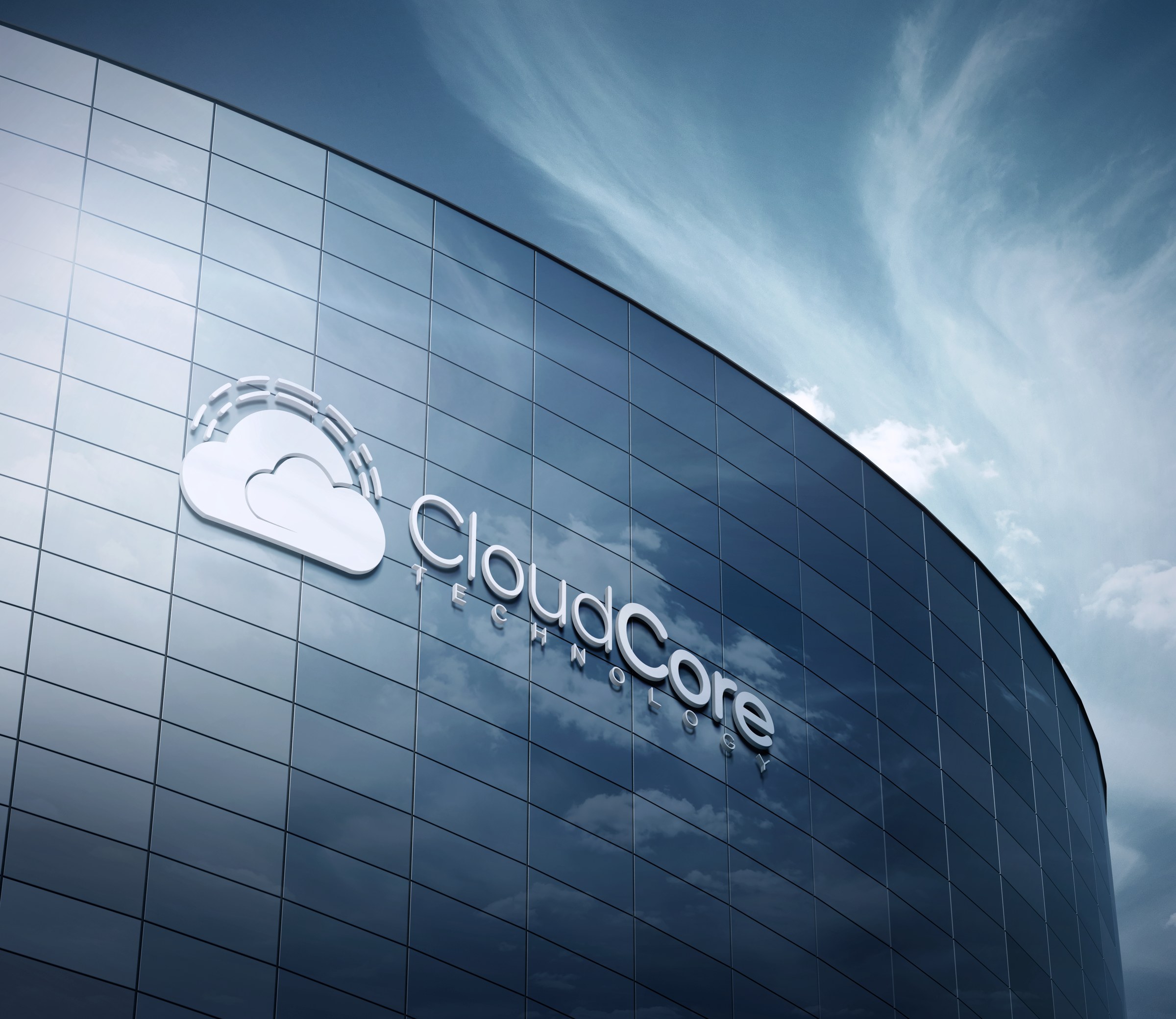 CloudCore logo on a curved glass tower facade.